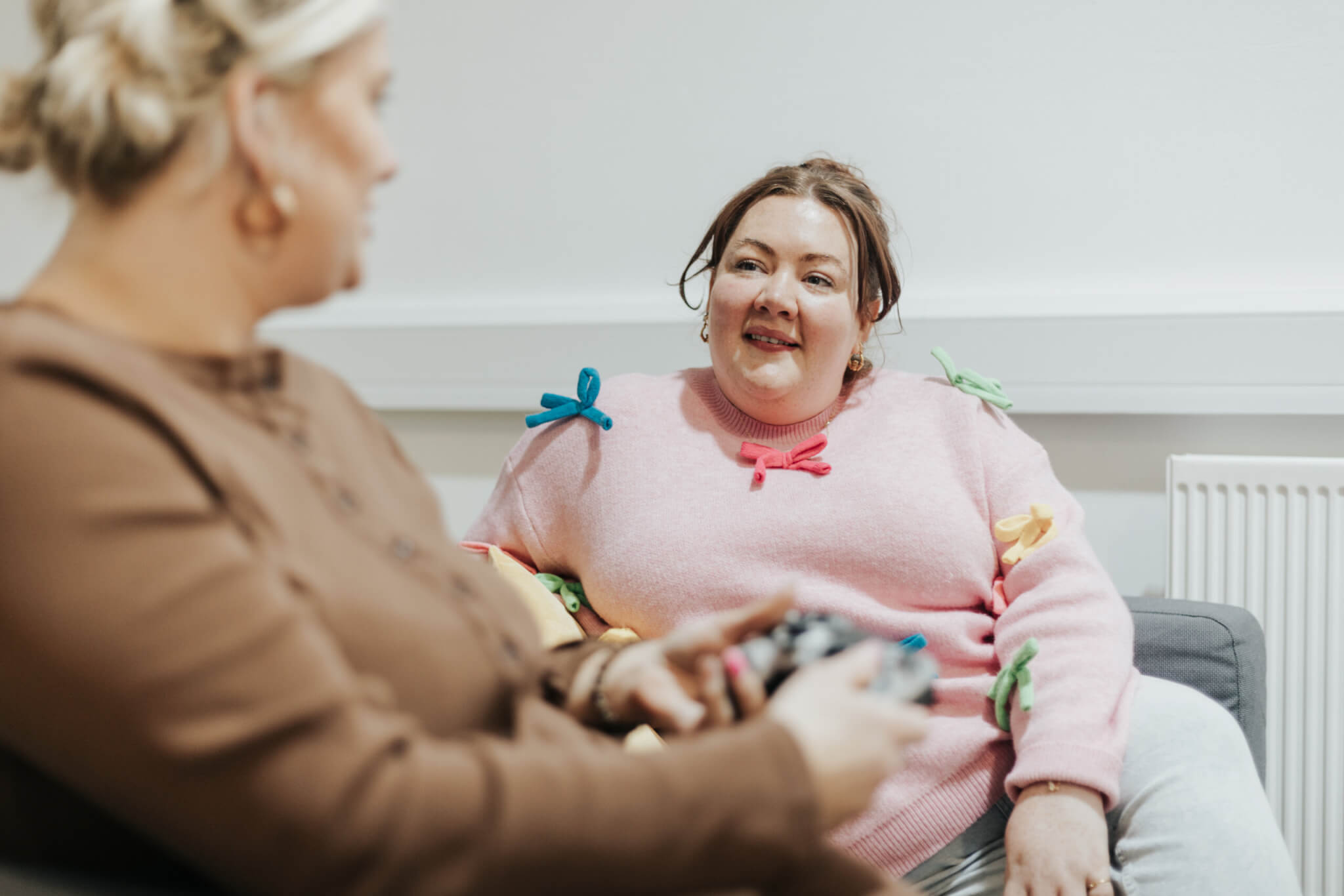 A learner speaking with a FIT team member